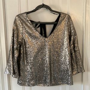Sparkle like the star you are! Very cute party blouse.